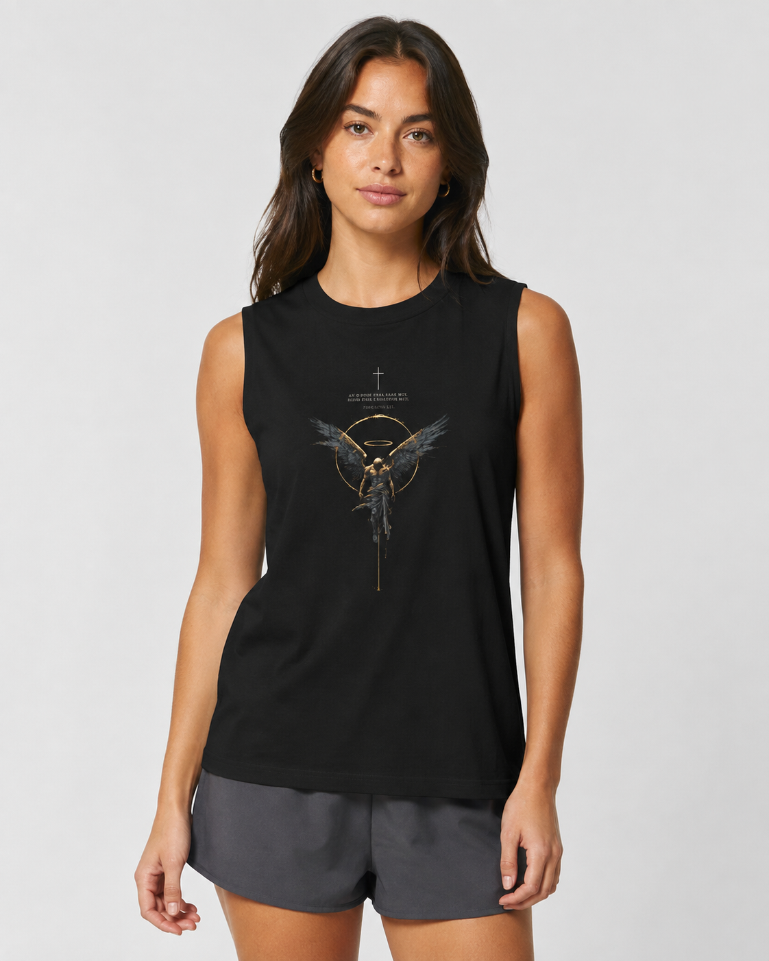 A woman modeling a black sleeveless athletic tank top with a central graphic of an angel and the words 'GOD IS LOVE', paired with gray shorts, against a light gray studio background.