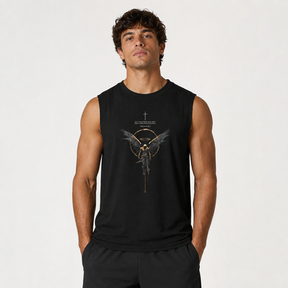 A man wearing a black sleeveless muscle tank top with a gold and white graphic of a winged figure and the text 'THE MIGHTY GHOST' on the chest, set against a plain light gray background.