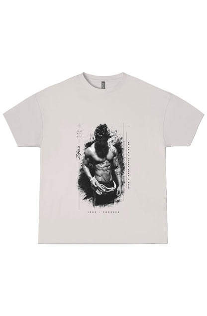 A light beige crewneck t-shirt featuring a black and white graphic print of a muscular man with a wolf head on the front, displayed flat against a white background.