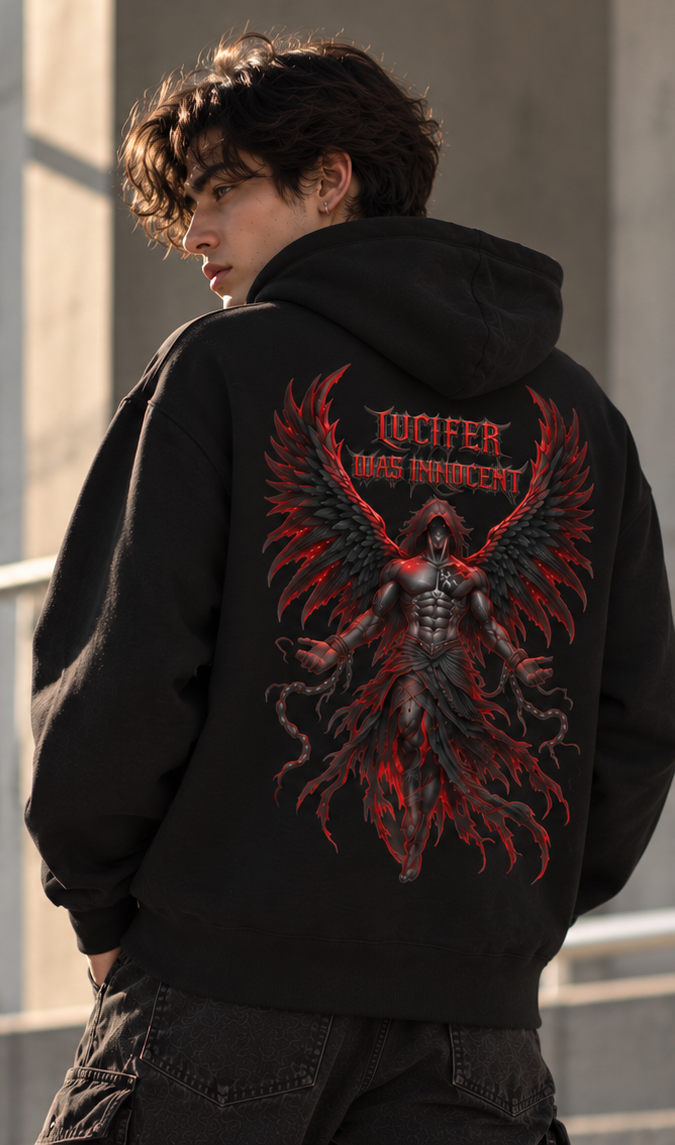 A person shown from the back wearing a black hoodie with a large red and gray winged graphic and the text 'LUCIFER WAS HONORED' printed on the back, photographed in an outdoor urban setting.