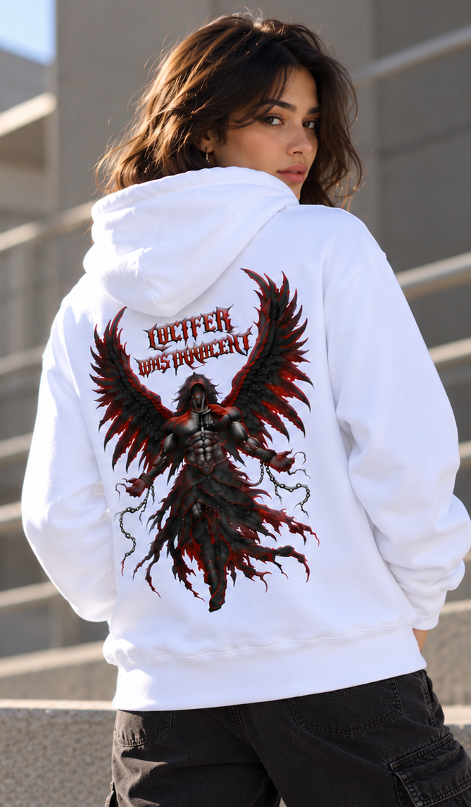 A woman wearing a white hoodie with a large graphic print on the back, photographed outdoors against concrete steps. The hoodie features a dark red and black winged figure with the text 'DEITTER WAS HERR!' in red lettering.